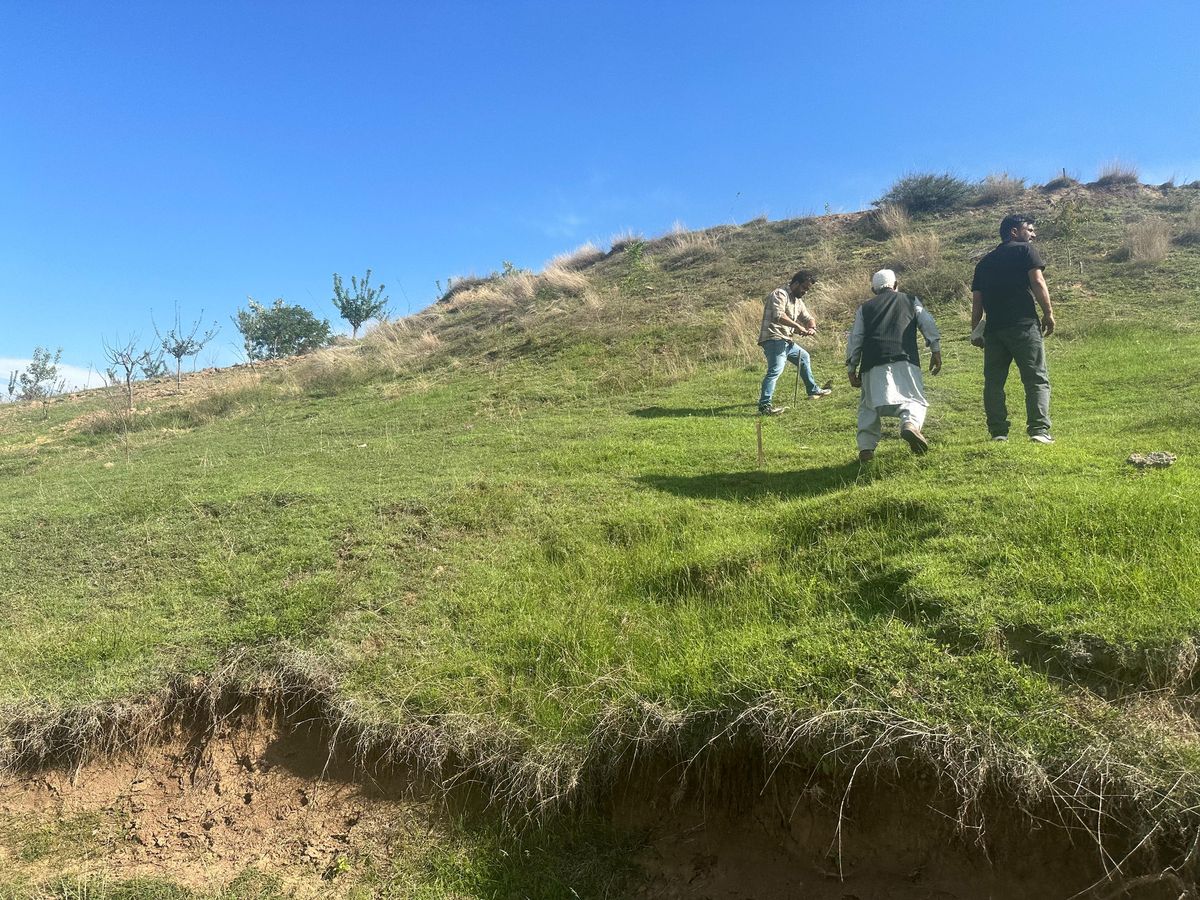 Team staking out the land